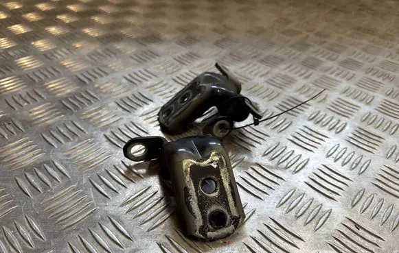 Front door lower hinge