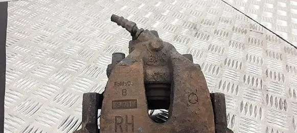 Mazda 3 II Front brake caliper