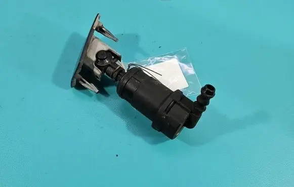 Opel Zafira B Headlight washer spray nozzle 325769024 IMPRK1576809