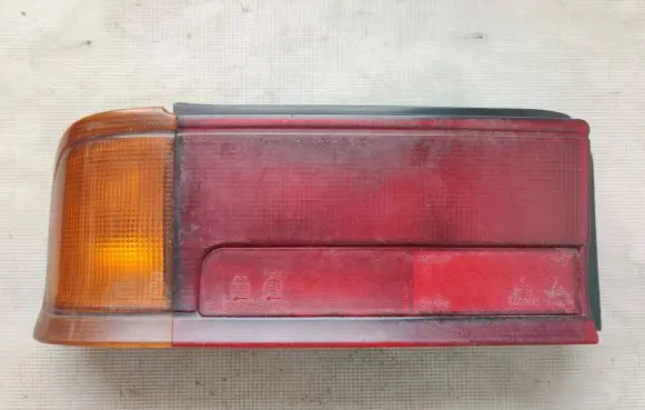 Mitsubishi Colt Tail light bulb cover holder 0438557L 2057