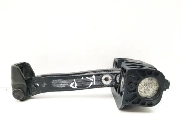 Front door check strap stopper
