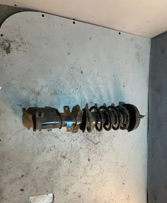 Opel Vivaro Front shock absorber with coil spring