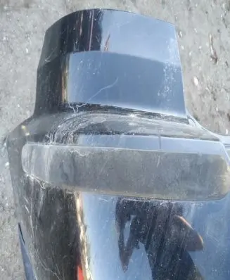 Rear bumper trim bar molding