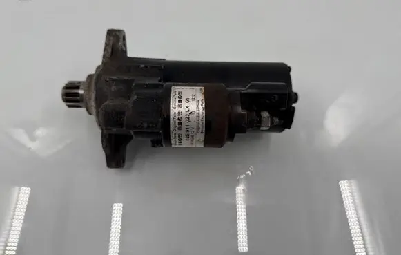 Volkswagen PASSAT B6 Starter motor 02E911023LX01 RF74E4512