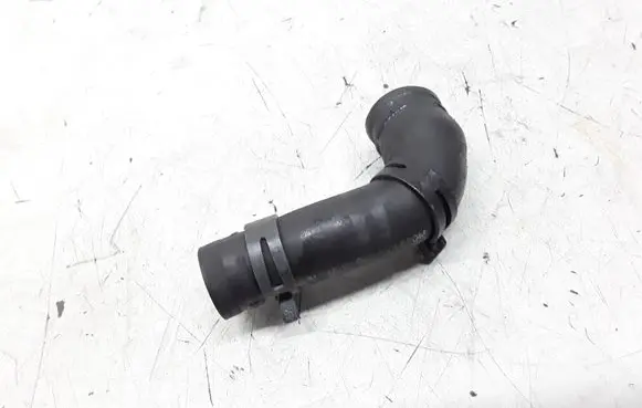 Volkswagen PASSAT B5 Engine coolant pipe/hose 048121063