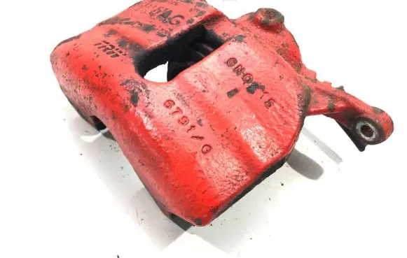 Volkswagen Golf VII Front brake caliper 