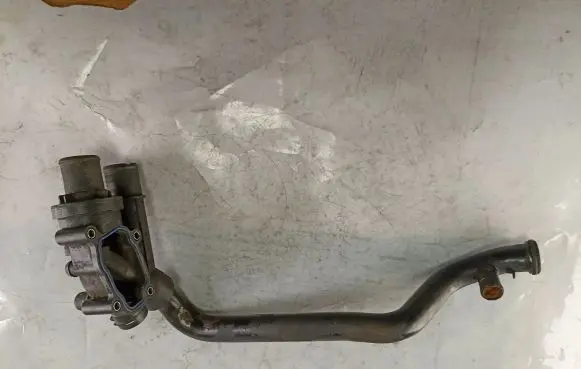 Thermostat/thermostat housing
