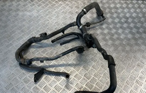 Volkswagen Caddy Engine coolant pipe/hose 03L121131AA