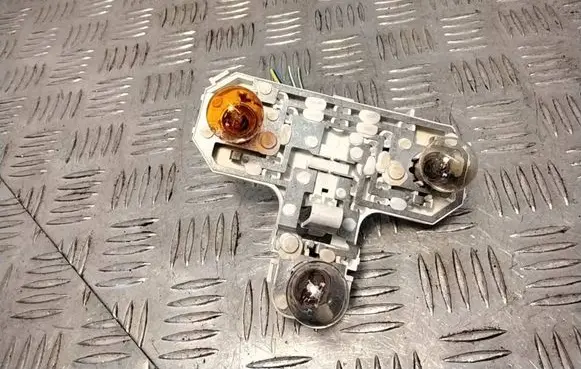 Volvo S80 Tail light bulb cover holder