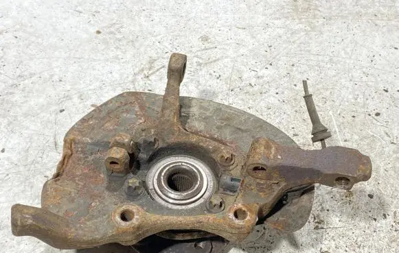 Front wheel hub spindle knuckle