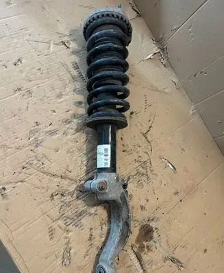 Maserati Ghibli Front shock absorber with coil spring 06700088970
