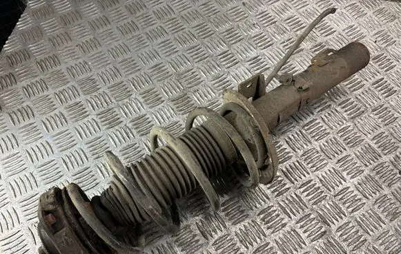 Volkswagen Polo IV 9N3 Front shock absorber with coil spring