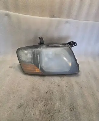 Mitsubishi Pajero Headlight/headlamp 10087420