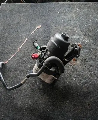 Seat Leon (5F) Oil filter mounting bracket 03N117021