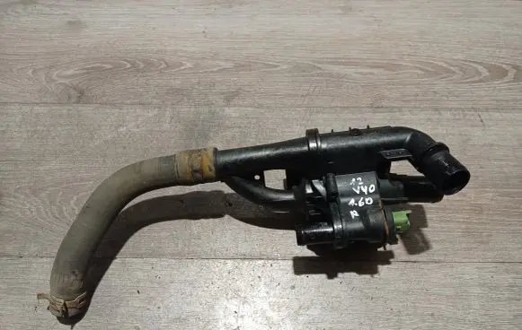 Thermostat/thermostat housing