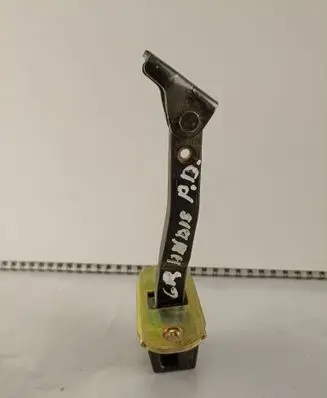 Front door check strap stopper