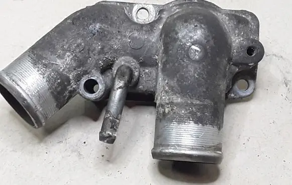 Thermostat/thermostat housing
