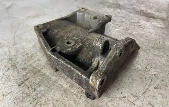 Mitsubishi Pajero Sport I A/C compressor mount bracket 