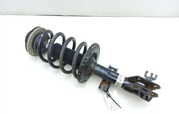 Front shock absorber with coil spring