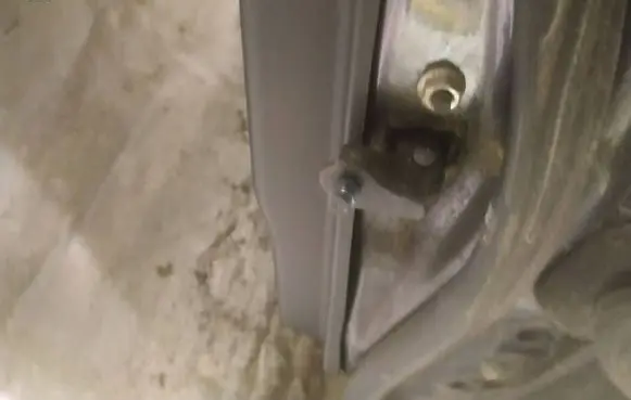 Rear door check strap stopper