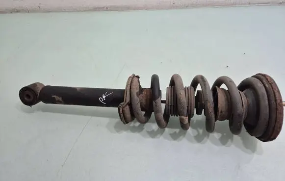 Mitsubishi Pajero Front shock absorber with coil spring 