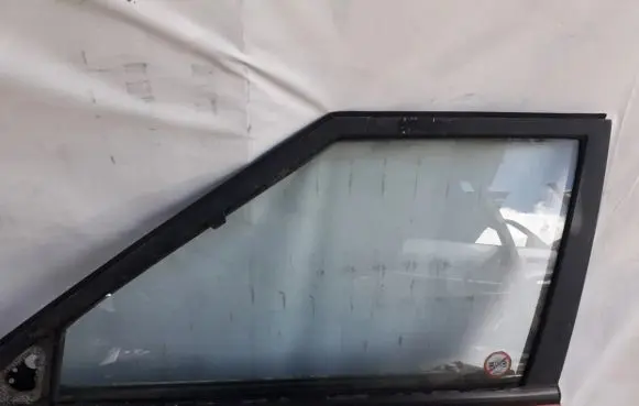 Mazda 323 F Front door window glass four-door ISED