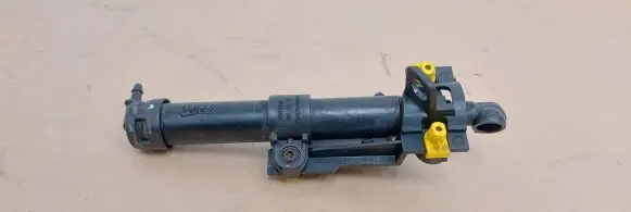 Headlight washer spray nozzle