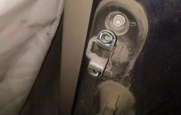 Rear door check strap stopper