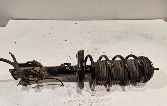 Opel Corsa D Front shock absorber/damper 13214354