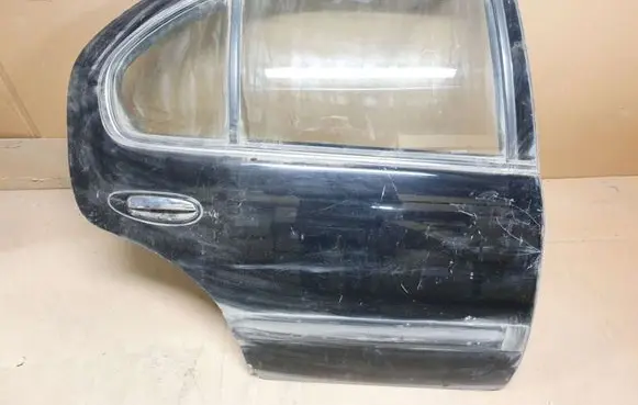 Nissan Maxima Rear door