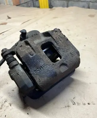 KIA Carens III Front brake caliper
