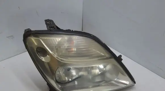 Renault Scenic I Headlight/headlamp 7700432097