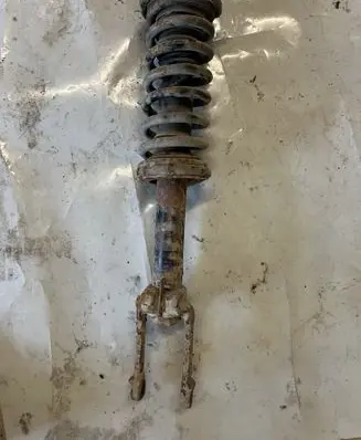 Jeep Grand Cherokee (WK) Front shock absorber with coil spring