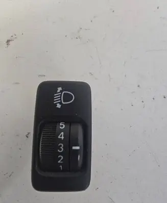 Headlight level height control switch