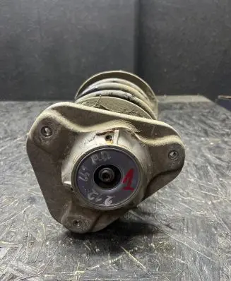 Front shock absorber with coil spring