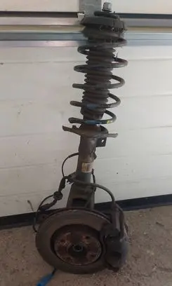 Front wheel hub spindle knuckle