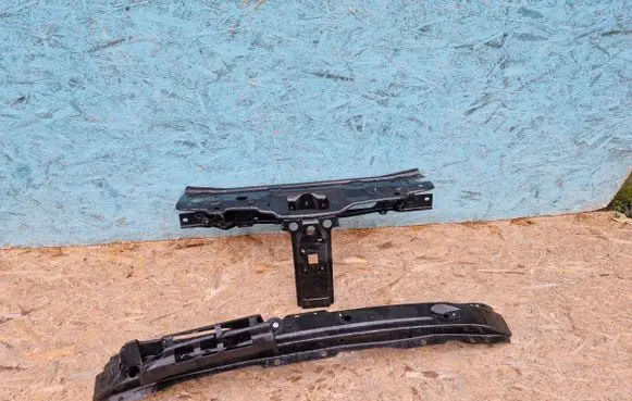 Radiator support slam panel