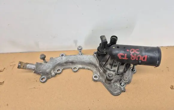 Thermostat/thermostat housing