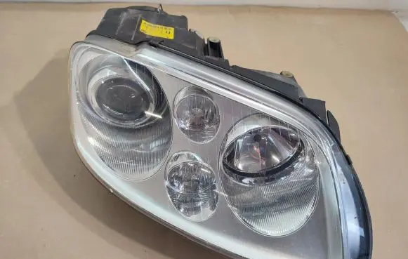 Volkswagen Touran I Headlight/headlamp 0301205272