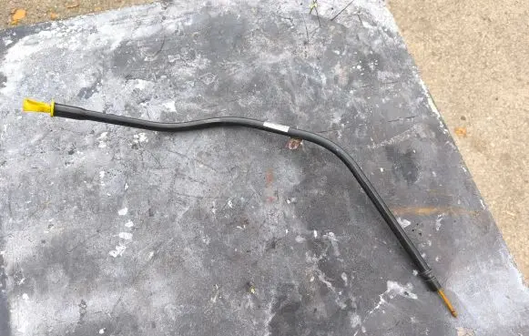 Oil level dip stick