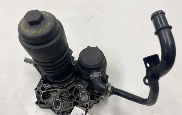 Oil filter mounting bracket