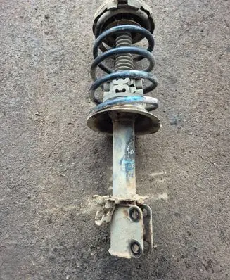 Renault Scenic I Front shock absorber with coil spring 7700844056C 558031