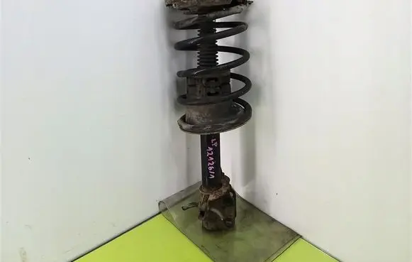 Renault Megane I Front shock absorber with coil spring 7700412915A