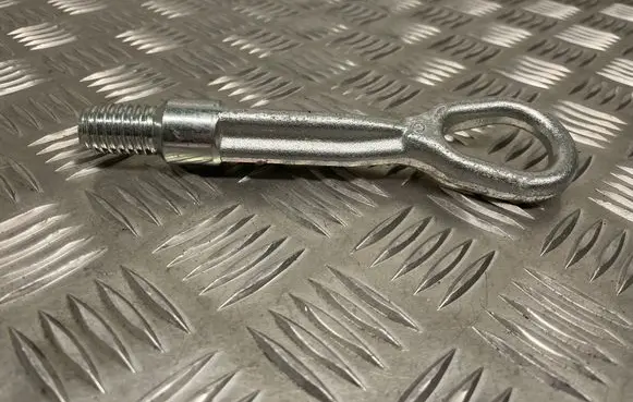 Towing hook eye