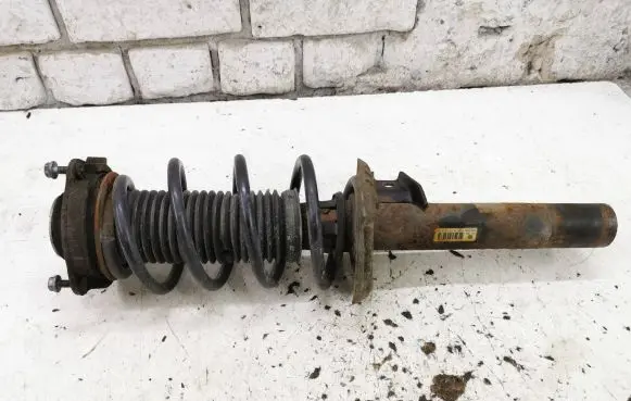 Skoda Octavia Mk2 (1Z) Front shock absorber with coil spring 1K0413031BF