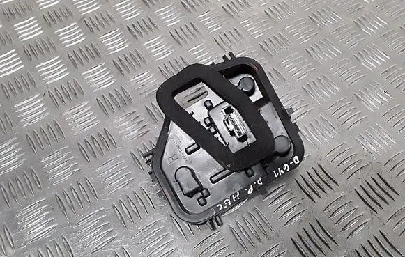 Tail light bulb cover holder