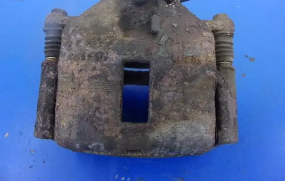 Nissan Almera Tino Front brake caliper