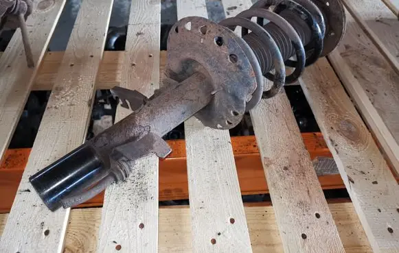 Front shock absorber with coil spring