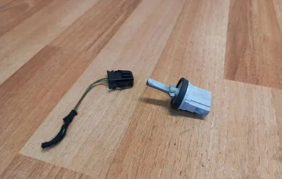 Volkswagen Touareg I Interior temperature sensor 1K0907543A