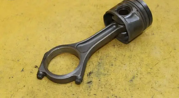 Piston with connecting rod